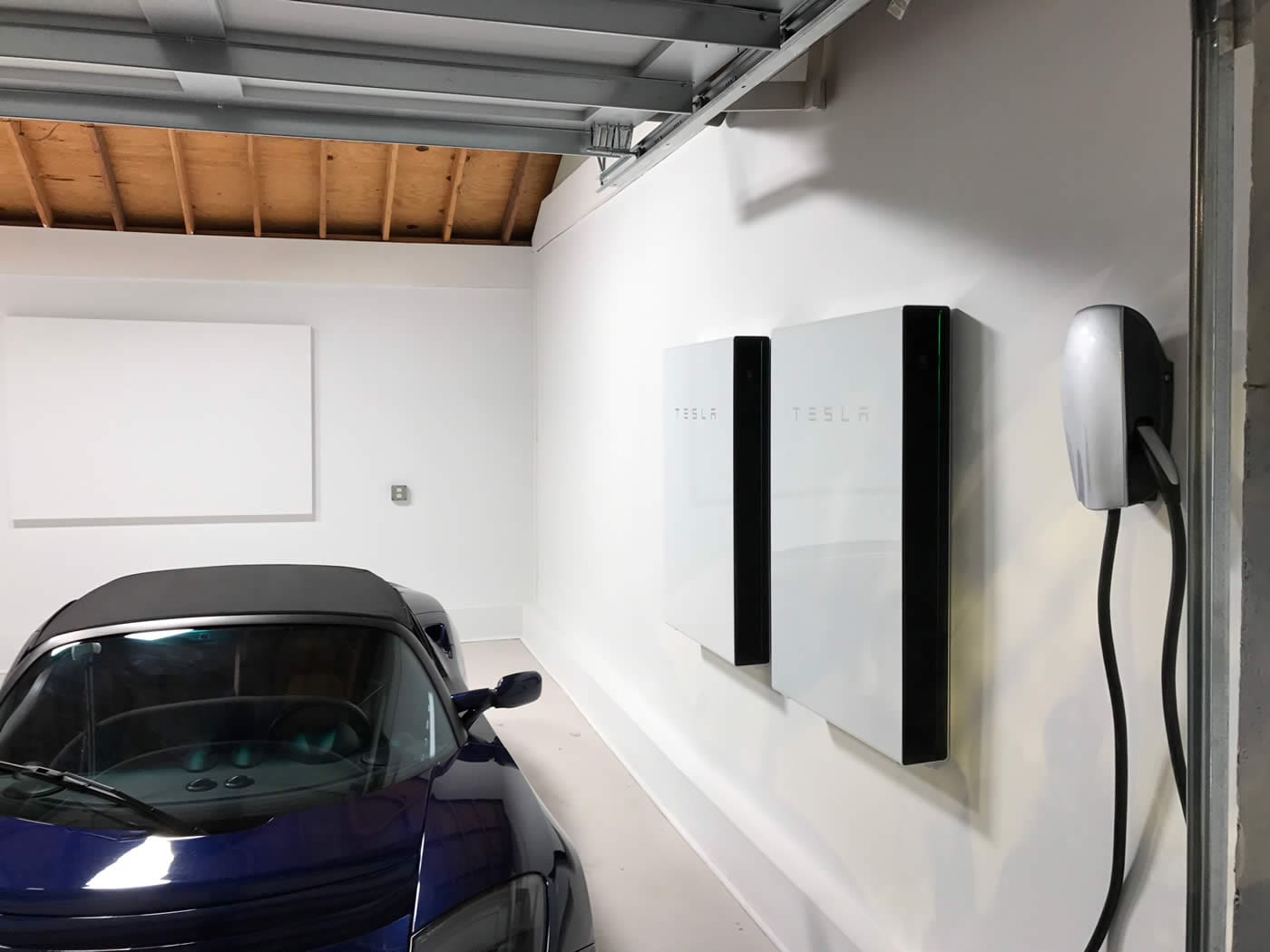 Solar batteries in garage with EV car