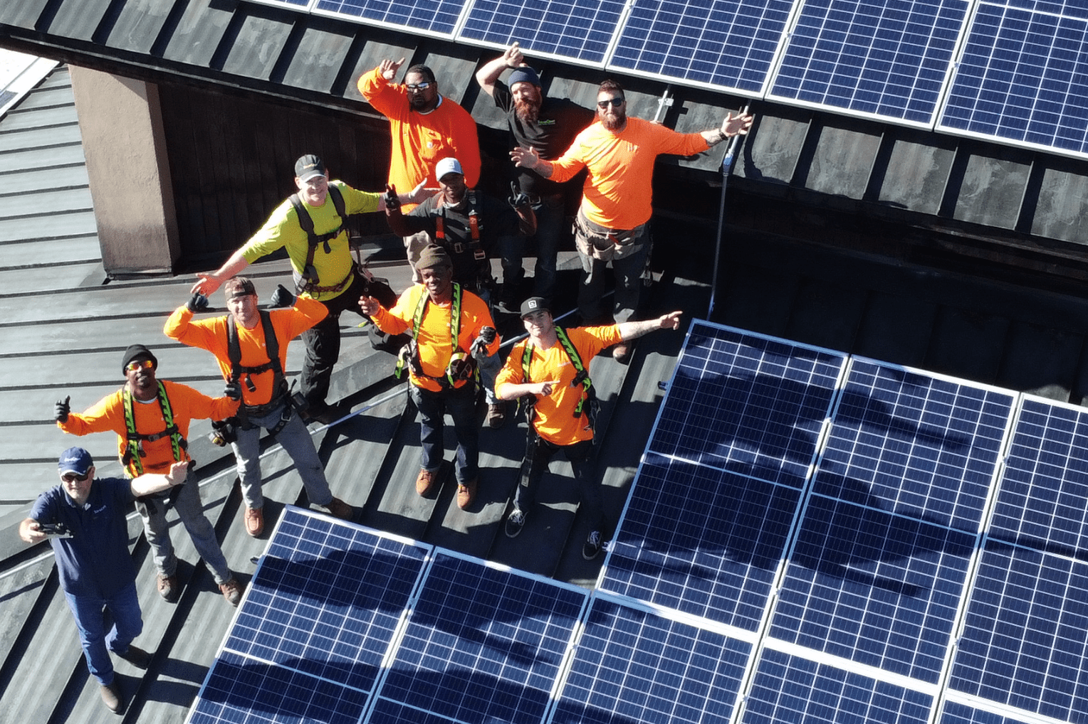 solar installers on roof