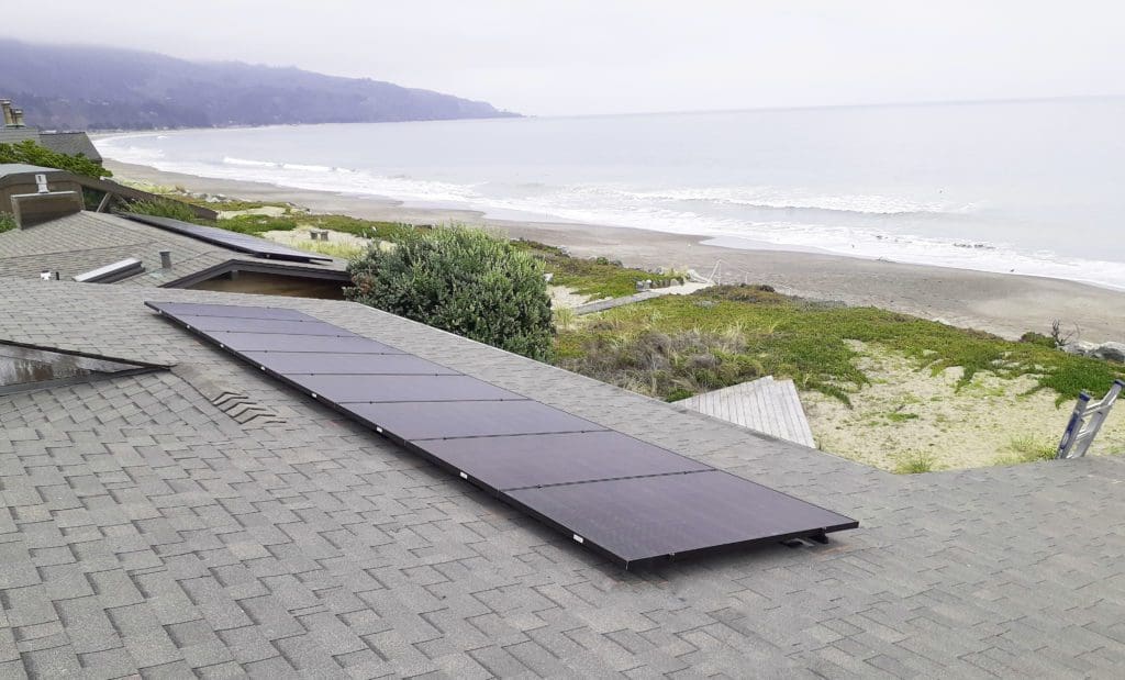solar panels on rooftop near beach