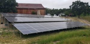 solar panels on winery grassy hillside