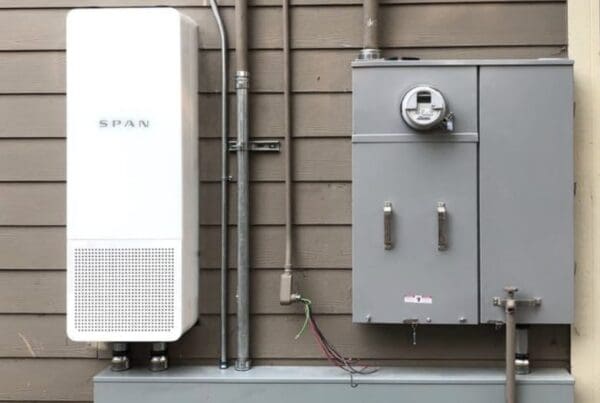 Span electric panel on side of house